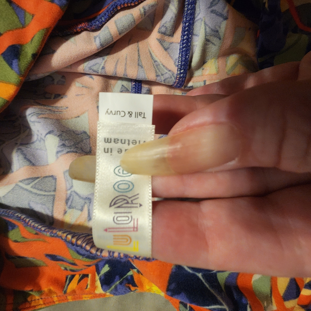 LuLaRoe Vibrant Orange and Blue Patterned Leggings - Picture 2 of 2
